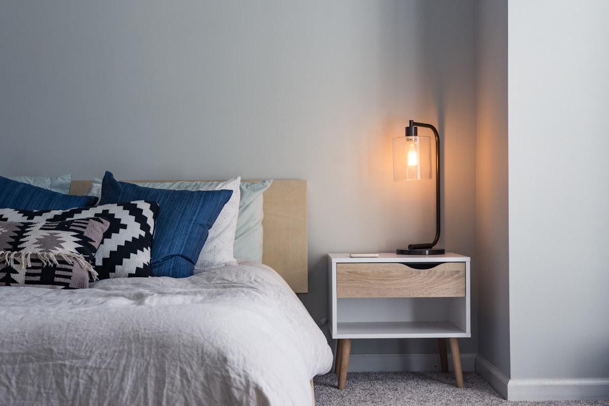 Karisimbi suite: king bed dressed in wool and linen