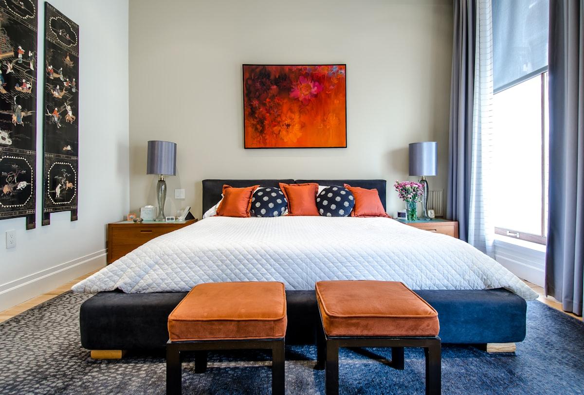 Bisoke suite: twin-or-king bed in warm evening light