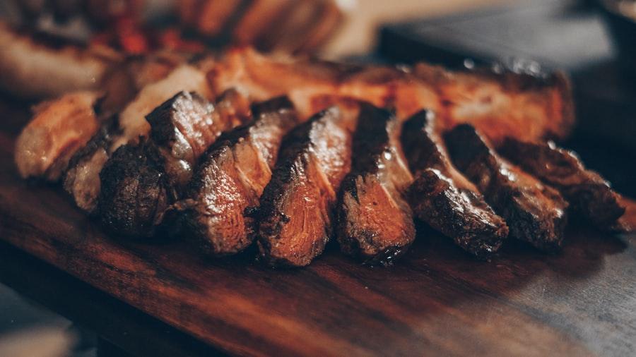 Umuriro grill demo — fire-roasted meat over charcoal