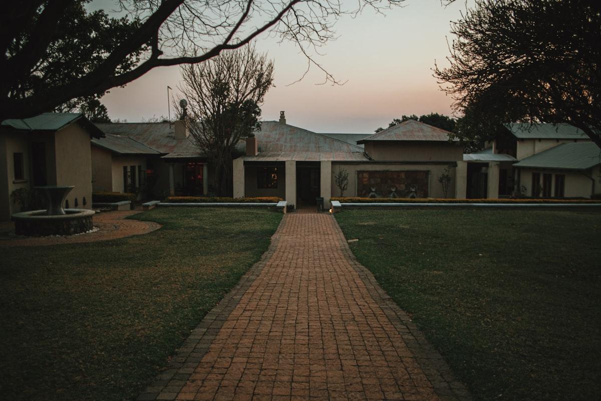 Stone and clay walls of the lodge at dusk